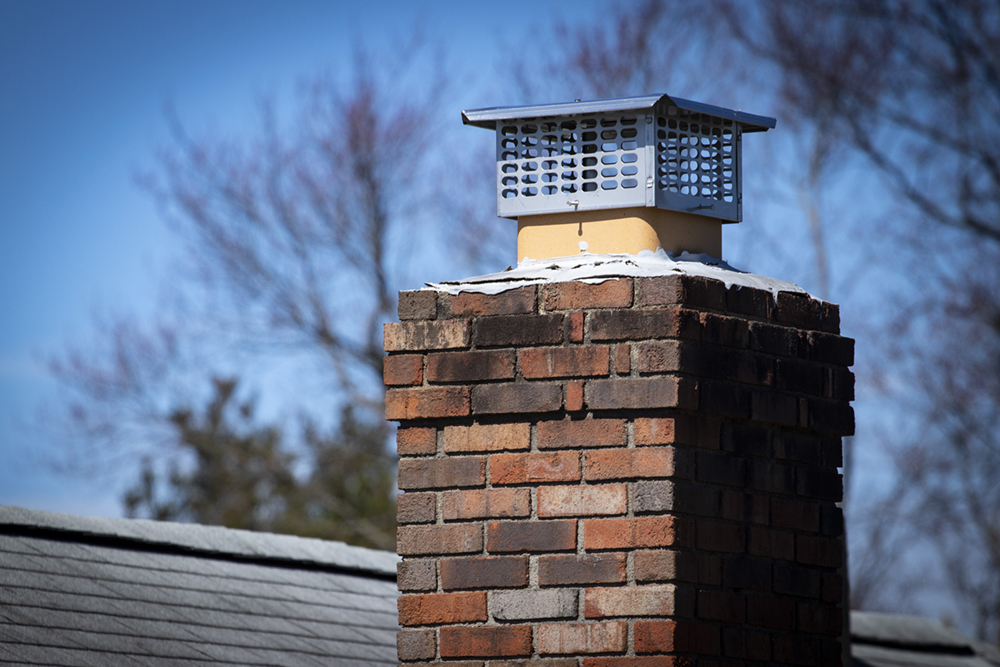 chimney cap installed on top of flue